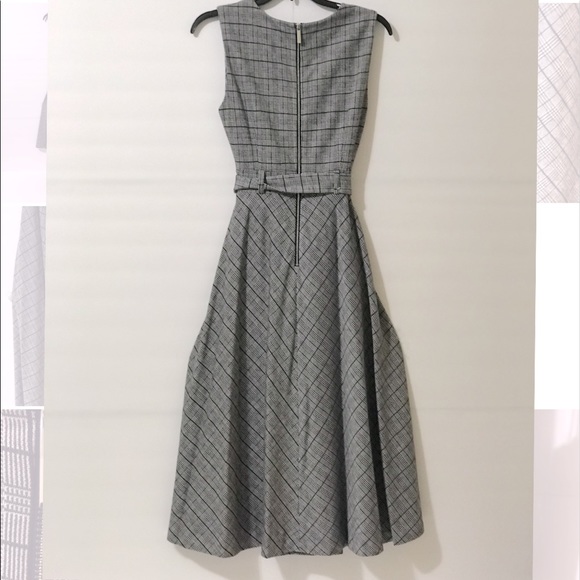 Calvin Klein
Belted Stretch Midi Dress - Picture 2 of 15